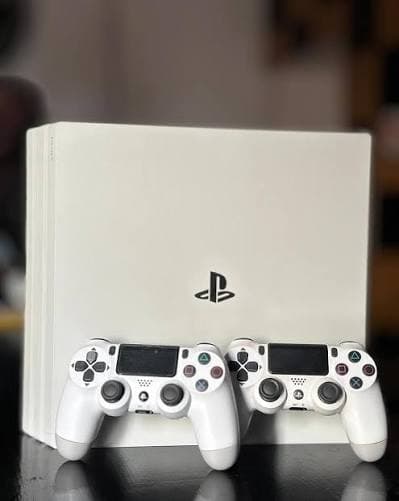 Renewed Sony PlayStation 4 Pro 1TB Console with 2 DUALSHOCK White Controllers